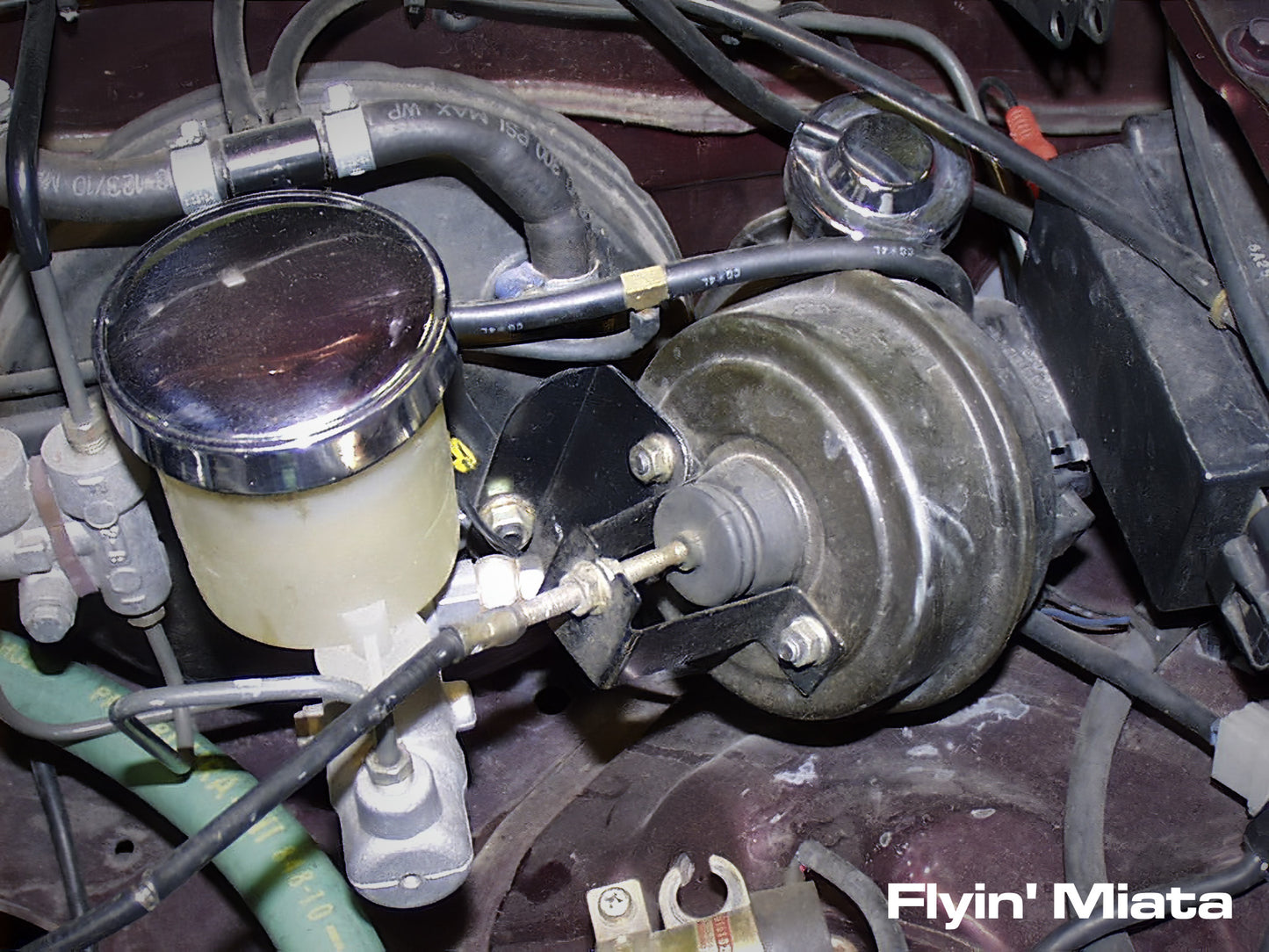 Cruise control relocation bracket