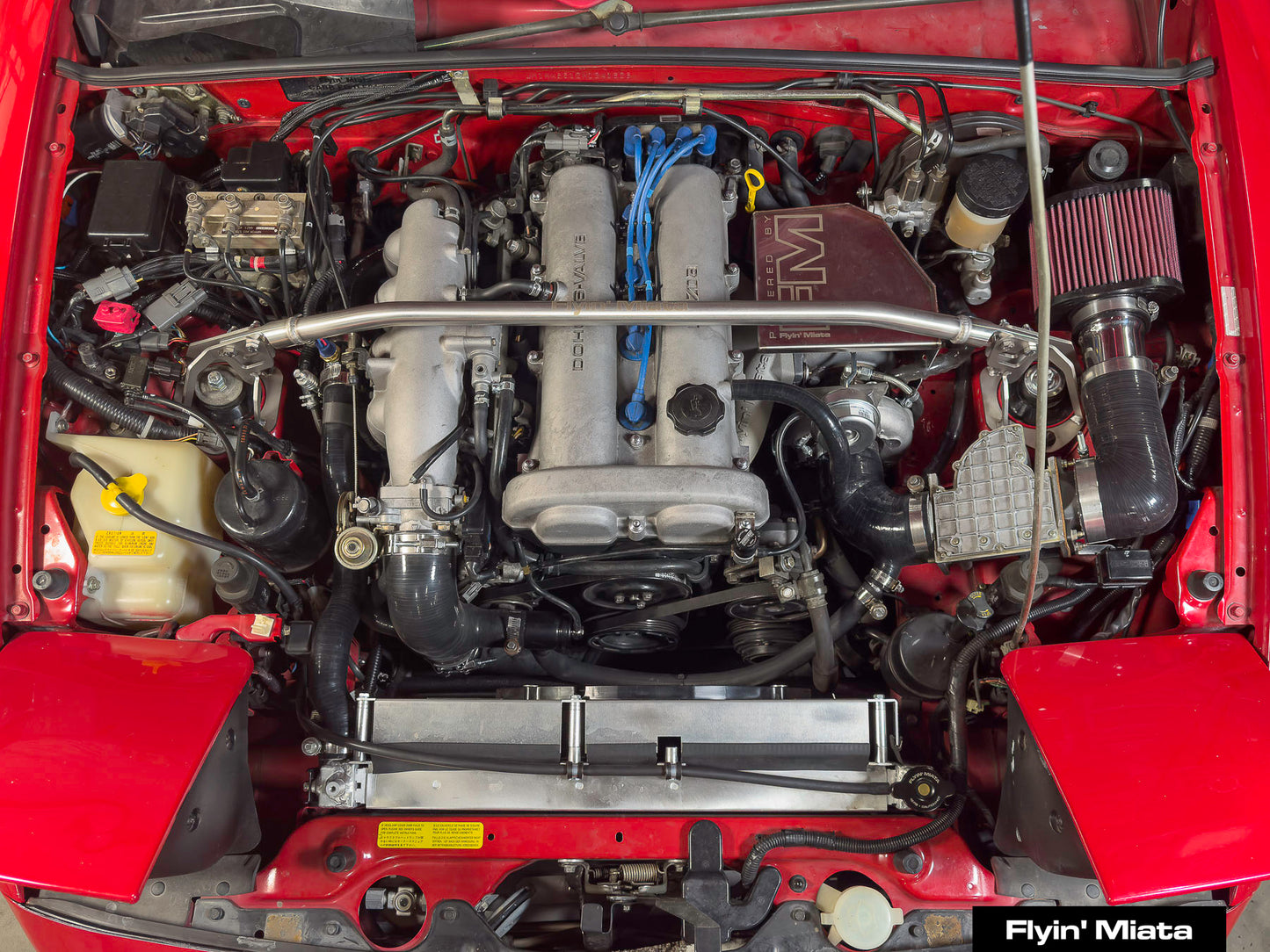 Flyin Miata coolant reroute