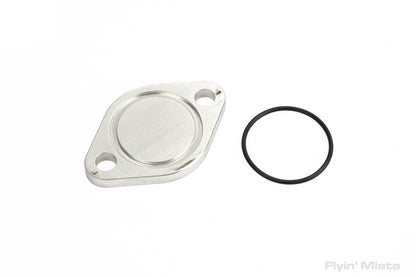 Thermostat neck removal coolant block-off plate for head