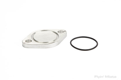 Thermostat neck removal coolant block-off plate for head