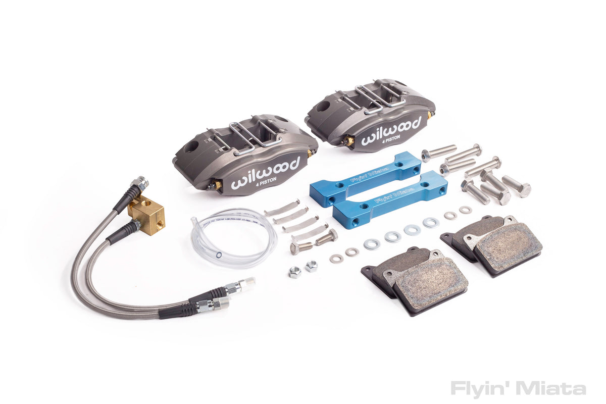 A four-piston aluminum caliper on the rear with a parking brake? 3 lbs ...