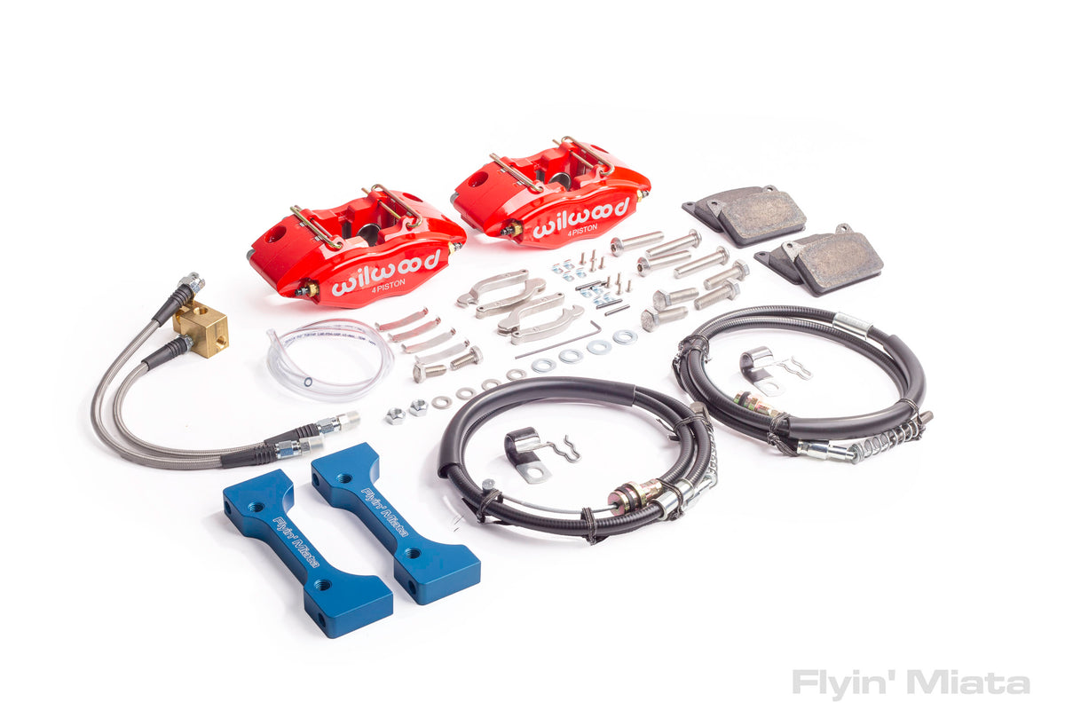 A four-piston aluminum caliper on the rear with a parking brake? 3 lbs ...