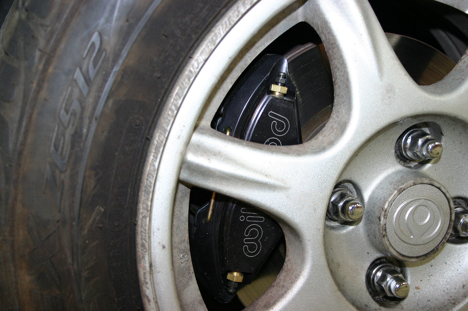 Biston Rear Brake A four-piston aluminum caliper on the rear with a parking brake? 3 lbs ...