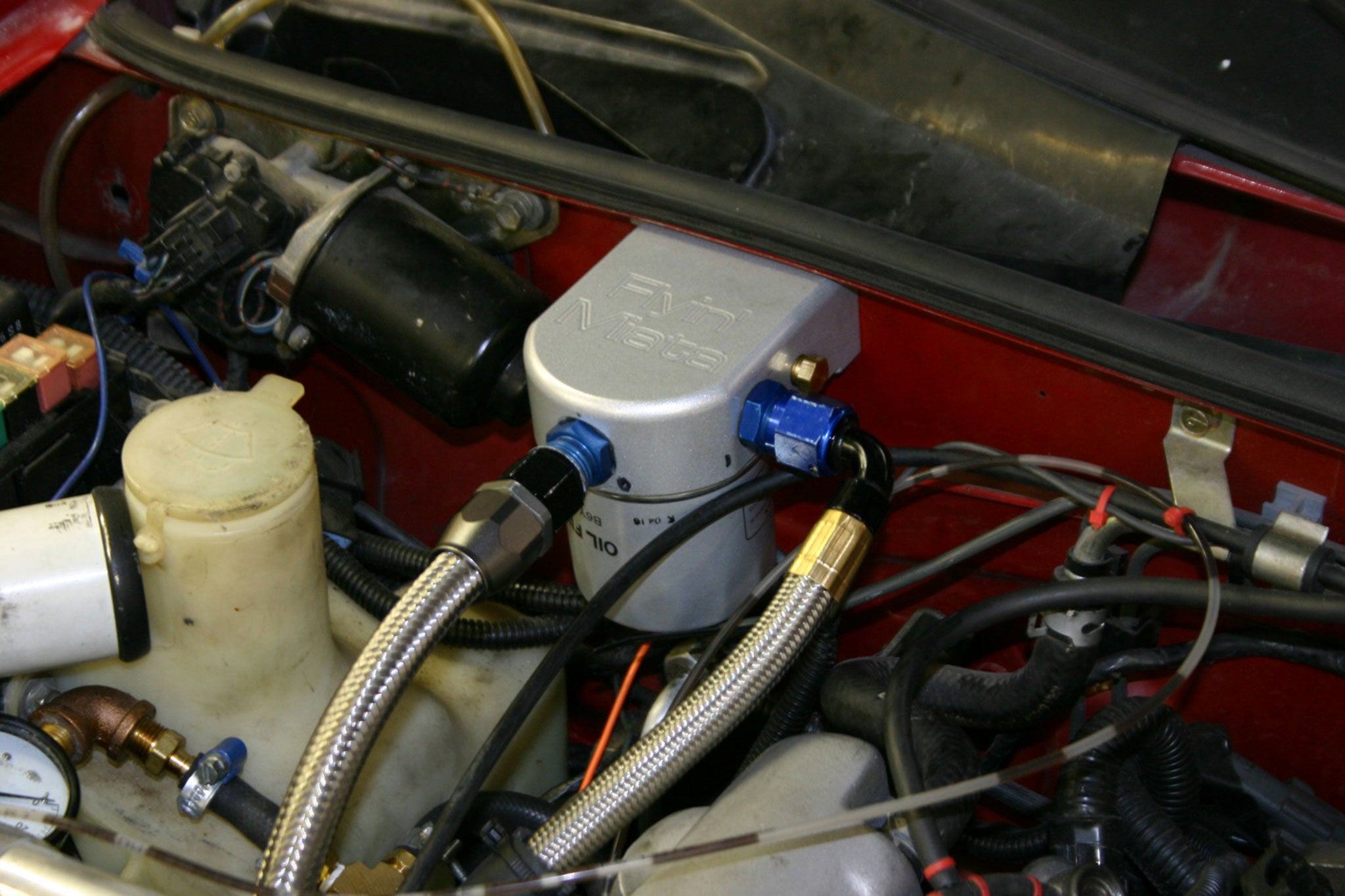 Oil Filter Relocation R32 A high quality relocation kit with stainless steel lines and optional ...