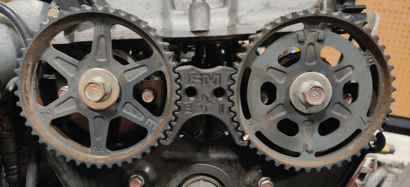 Easy to use, holds the cams while you torque the bolts, and (nearly